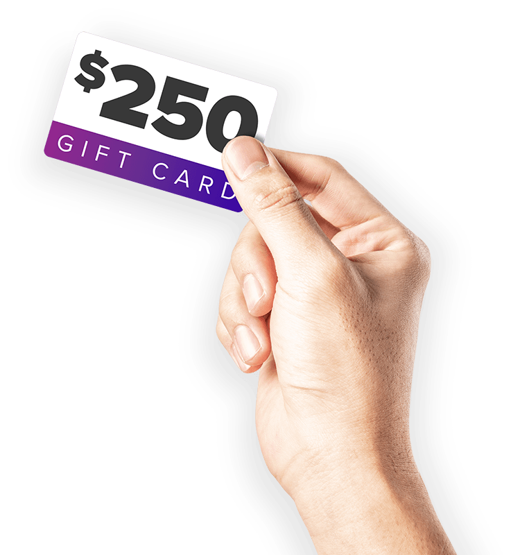 Hand holding $250 gift card
