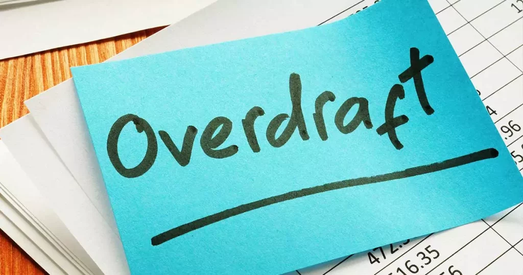 How to Avoid Overdraft Fees Blue Sticky Post It Note