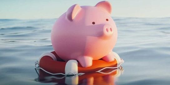 Emergency Rent Loans Piggy Bank Floating on Raft in the Water
